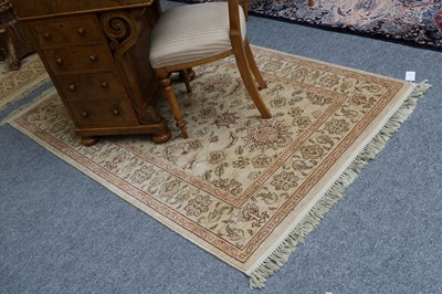 Lot 1123 - A Machine Made Rug, the cream field of...