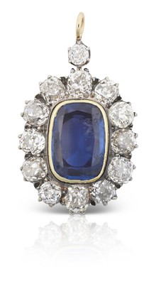 Lot 2273 - A Sapphire and Diamond Cluster Pendant