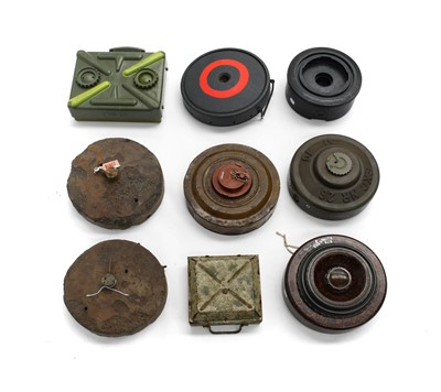 Lot 2148 - A Collection of Nine Inert Landmines,...