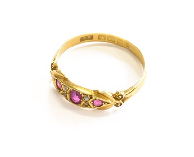 Lot 207 - An 18 Carat Gold Ruby and Diamond Five Stone...