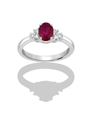 Lot 2319 - An 18 Carat White Gold Synthetic Ruby and...