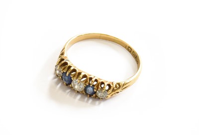 Lot 225 - An 18 Carat Gold Sapphire and Diamond Five...