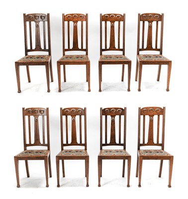 Lot 1247 - A Set of Eight Arts & Crafts Oak Dining Chairs,...