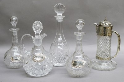 Lot 4 - A Pair of Cut Glass Decanters, with silver...