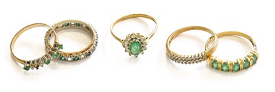 Lot 231 - A 14 Carat Gold Emerald Five Stone Ring,...