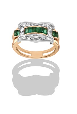 Lot 2298 - An Emerald and Diamond Ring a row of baguette...