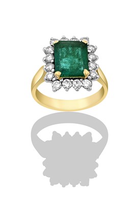 Lot 2277 - An Emerald and Diamond Cluster Ring the...