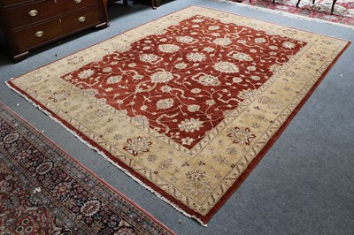 Lot 1017 - An Afghan 'Ziegler', the deep terracotta field...