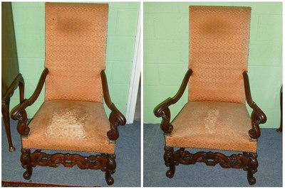 Lot 1273 - A Pair of 17th Century Style Walnut Open Armchairs, recovered in orange close nailed damask,...