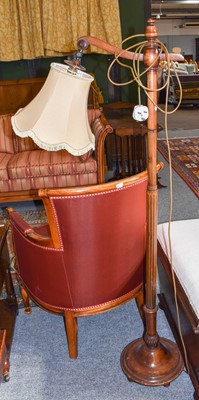 Lot 1276 - A Near Pair of Mahogany Standard Lamps, one...