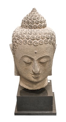 Lot 230 - A South East Asian Carved Stone Head of Buddha...