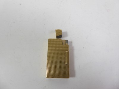 Lot 2070 - An Elizabeth II Gold Cigarette-Lighter