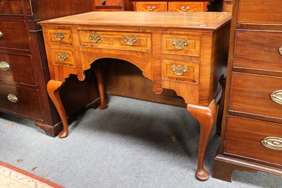 Lot 1192 - A 20th Century Featherbanded Mahogany Lowboy,...