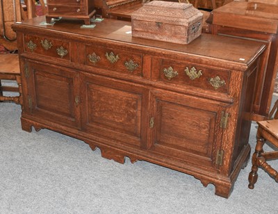 Lot 1155 - A George II Oak Enclosed Dresser Base, circa...