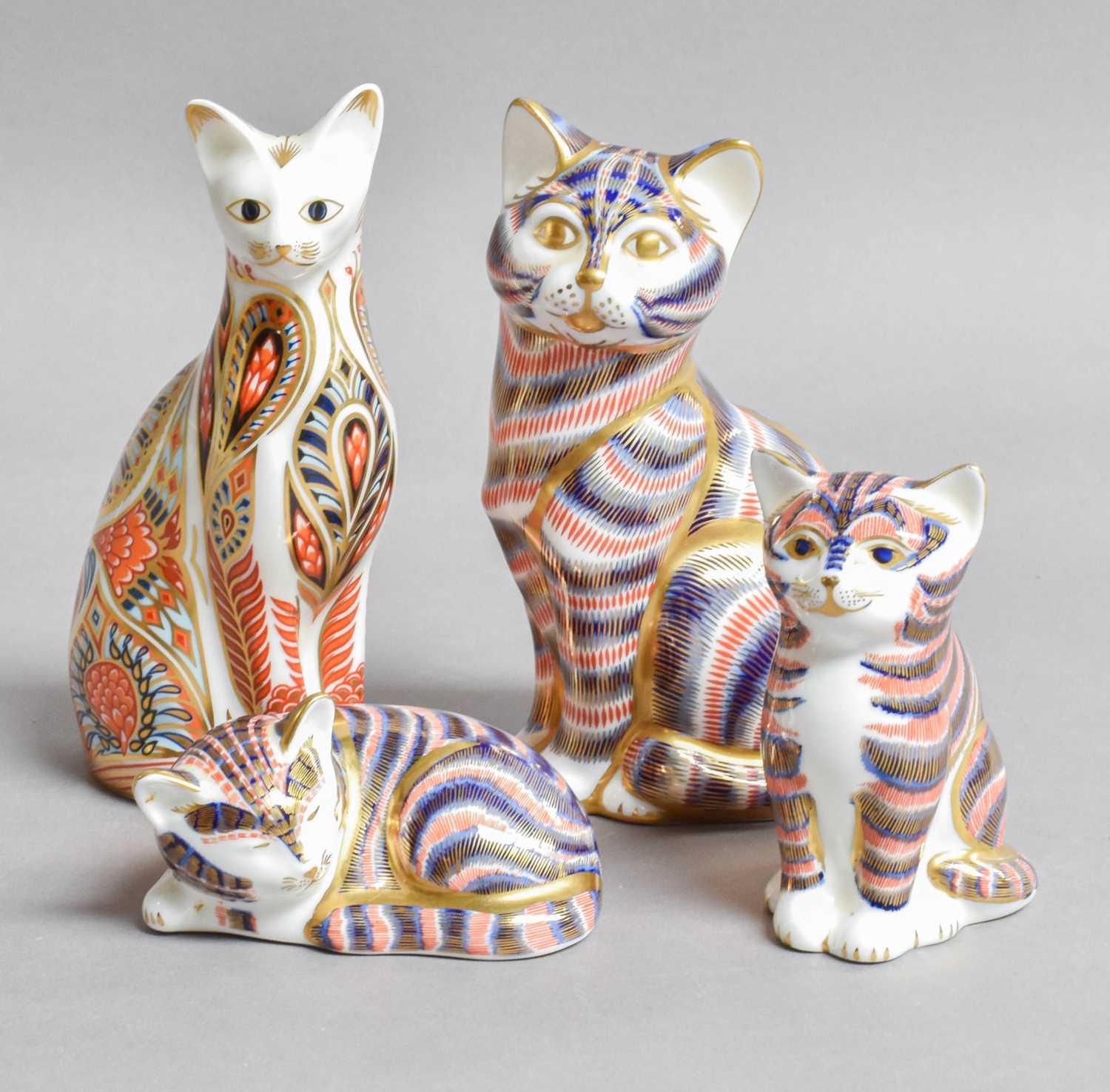 Lot 161 - Four Royal Crown Derby Cat Paperweights, all...