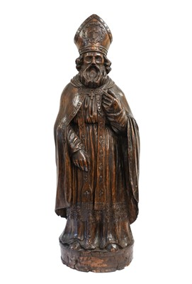 Lot 573 - A Carved Wood Figure of a Bishop, probably Low...