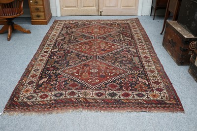 Lot 1002 - Khamseh Carpet, the indigo field with three...