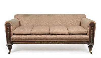 Lot 1276 - A Victorian Walnut Framed and Ormolu Mounted Country House Sofa, late 19th century, covered in pink