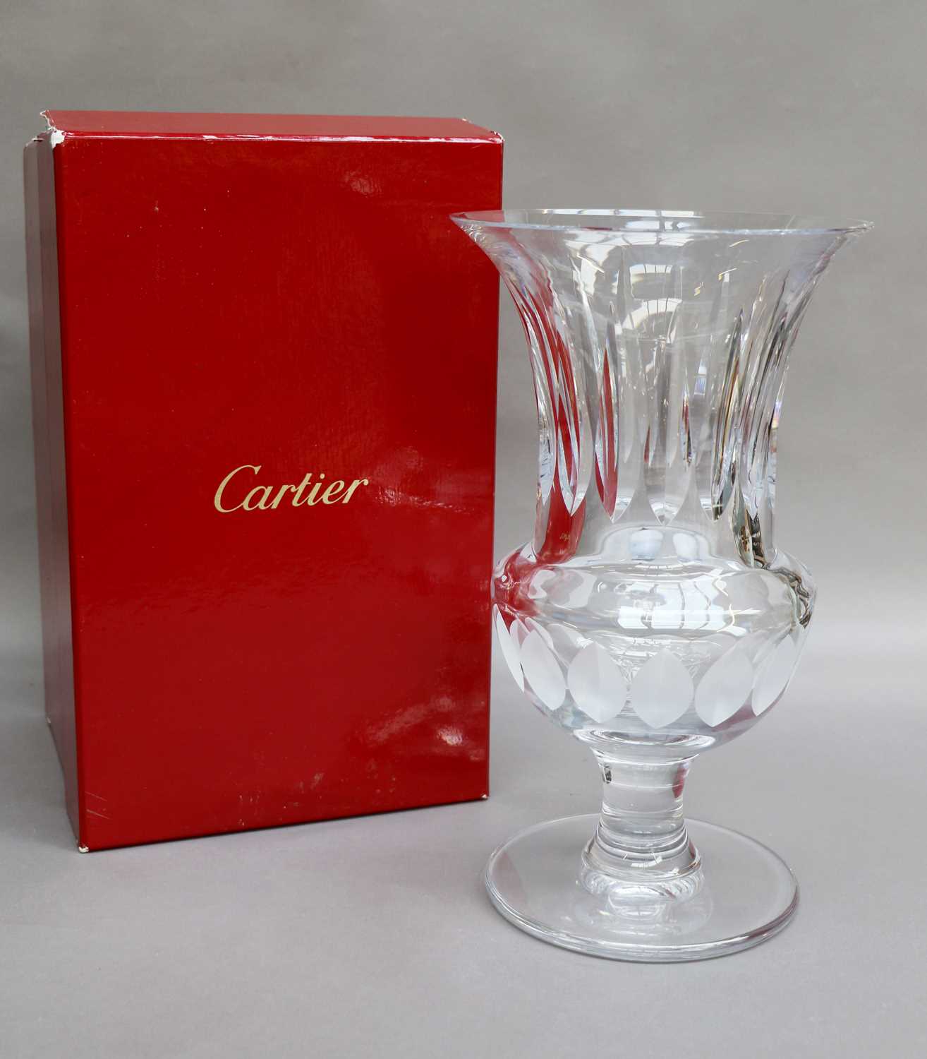 Lot 110 - A Cartier Cut Glass Pedestal Vase, of urn form,...