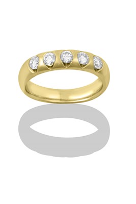 Lot 2341 - A Diamond Five Stone Ring the round brilliant...