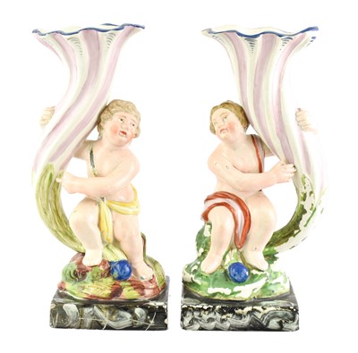 Lot 111 - A Pair of Pearlware Figural Spill Vases, circa...