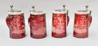 Lot 100 - A Set of four Ruby Glass Tankards, possibly...