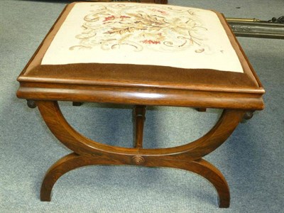 Lot 1281 - A Rosewood Cross Frame Stool, mid 19th century, with later needlework drop-in seat, 55cm by 55cm by