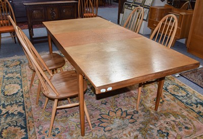 Lot 1351 - A Teak Extending Dining Table, mid 20th...