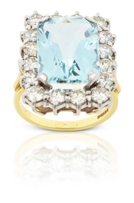 Lot 2306 - An 18 Carat Gold Aquamarine and Diamond Cluster Ring
