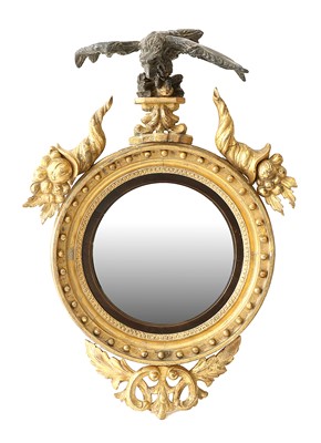 Lot 556 - A George III Gilt and Gesso Convex Mirror,...