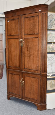 Lot 1337 - A Panelled Oak Standing Corner Cupboard, early...