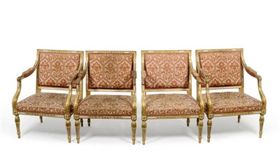 Lot 1282 - A Set of Four George III White Painted and Parcel Gilt Open Armchairs, repainted, with padded backs