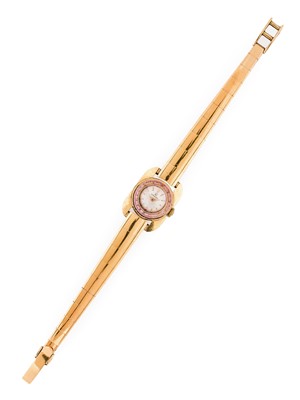 Lot 2205 - Omega: A Lady's 18 Carat Gold Wristwatch,...