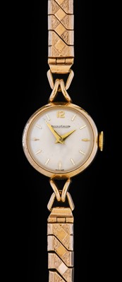 Lot 10 - A Lady's 9 Carat Gold Wristwatch, signed...