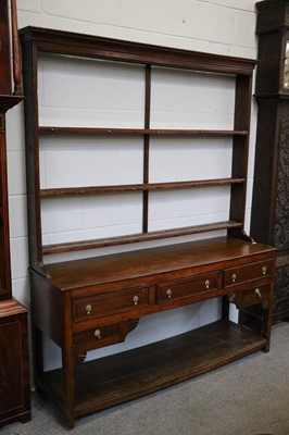 Lot 1101 - An Oak Dresser and Rack, 18th century, the...