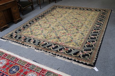 Lot 1011 - An Oriental Carpet, the pale lemon diamond...