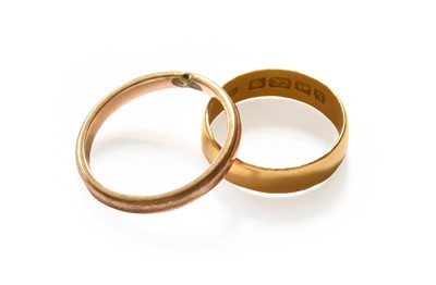Lot 17 - A 22 Carat Gold Band Ring, finger size I1/2;...