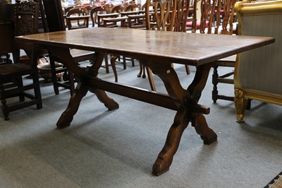 Lot 1157 - An Oak Refectory Table, the X-form supports...