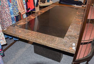 Lot 1110 - A Marble Top Dining Table, raised on two block...