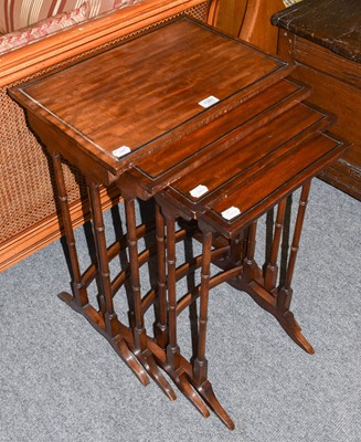 Lot 1281 - A Nest of Four Reproduction Spindle Leg Tables,...