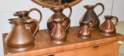 Lot 276 - A Group of Copper Harvest Jugs, 19th Century (7)