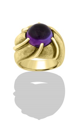 Lot 2412 - An Amethyst Ring the round cabochon amethyst...