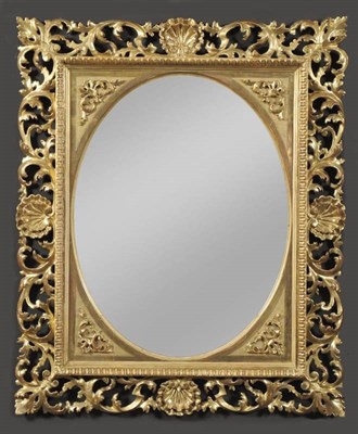 Lot 1285 - A 19th Century Gilt Gesso Florentine Wall Mirror, of rectangular form, with oval shaped moulded...