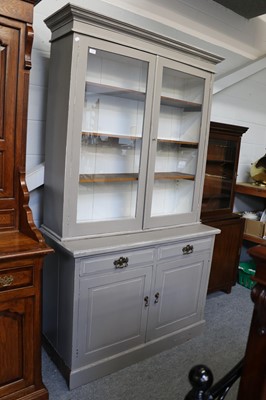 Lot 1238 - A Grey Painted Bookcase Cabinet, with glazed...