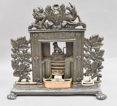 Lot 103 - A Small Cast Iron Model of a Fireplace