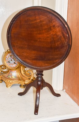 Lot 1255 - A Miniature Mahogany Tilt Top Table