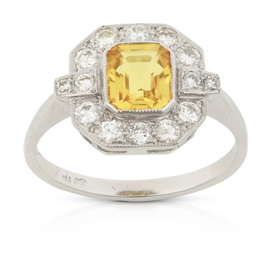 Lot 2245 - An Art Deco Style Yellow Sapphire and Diamond Cluster Ring