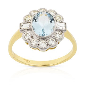 Lot 2327 - An Aquamarine and Diamond Cluster Ring