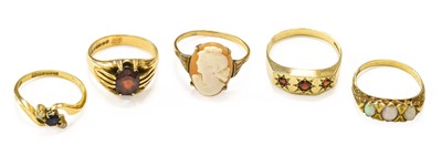 Lot 49 - Five Gem-Set Rings Including, a sapphire and...