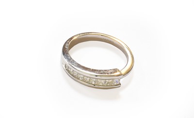 Lot 42 - An 18 Carat White Gold Diamond Half Hoop Ring,...
